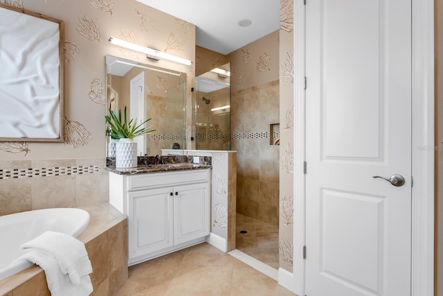 12663 Fontana Loop, Bradenton, FL 34211 - full bath featuring a garden tub, walk in shower, vanity, and tile patterned flooring