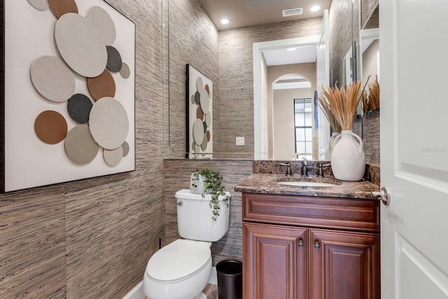 12663 Fontana Loop, Bradenton, FL 34211 - half bathroom featuring tile walls, vanity, and recessed lighting