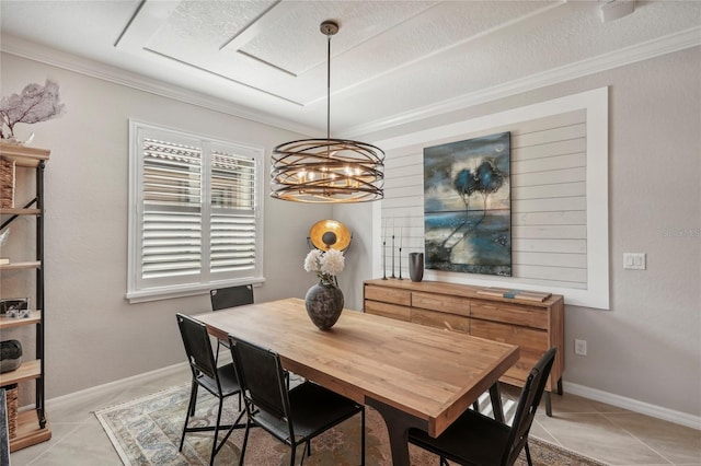 tiled dining room featuring crown molding, a textured ceiling, and an inviting chandelier