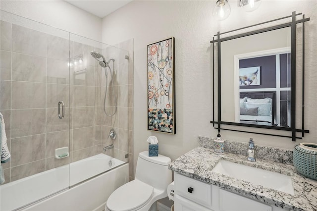 full bathroom featuring vanity, toilet, and enclosed tub / shower combo