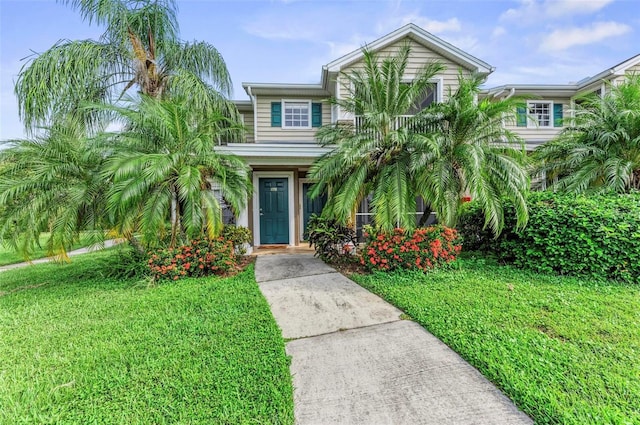 view of front of home with a front lawn