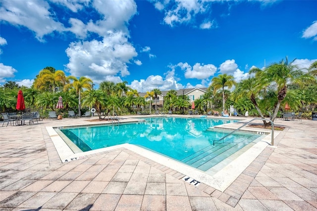 pool with a patio