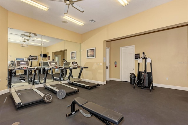 gym with visible vents, baseboards, and ceiling fan