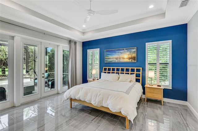 bedroom with access to outside, a raised ceiling, ornamental molding, ceiling fan, and french doors