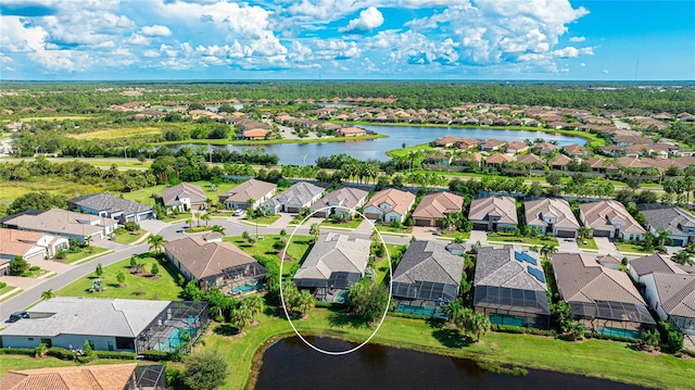 drone / aerial view with a water view