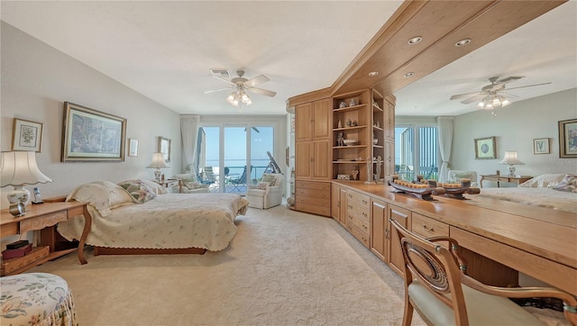 bedroom with access to outside, light carpet, and ceiling fan