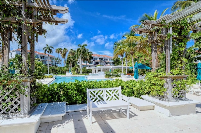 view of patio with a community pool