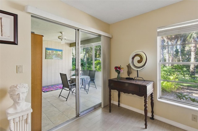 5071 Village Gardens Dr Unit 5, Sarasota, FL 34234 - dining area with baseboards and light wood-type flooring