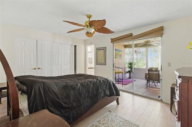 5071 Village Gardens Dr Unit 5, Sarasota, FL 34234 - bedroom with access to exterior, a closet, ceiling fan, and light wood finished floors