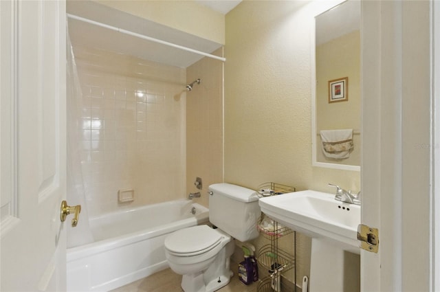 5071 Village Gardens Dr Unit 5, Sarasota, FL 34234 - full bathroom featuring tub / shower combination and a textured wall