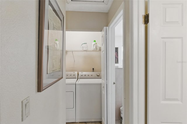 5071 Village Gardens Dr Unit 5, Sarasota, FL 34234 - laundry room with washer and clothes dryer