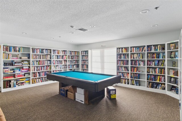 5071 Village Gardens Dr Unit 5, Sarasota, FL 34234 - playroom featuring carpet, a textured ceiling, and recessed lighting