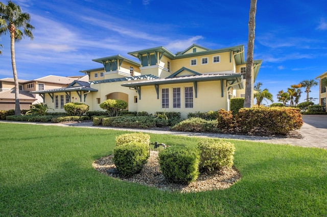 view of front facade with a front lawn