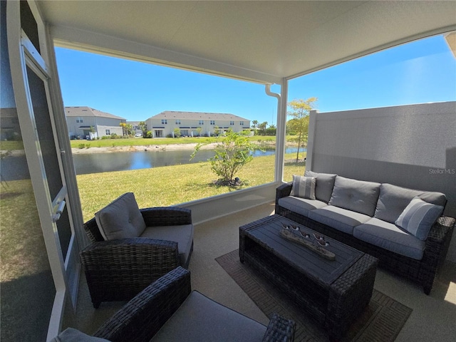 view of patio with a water view and an outdoor living space