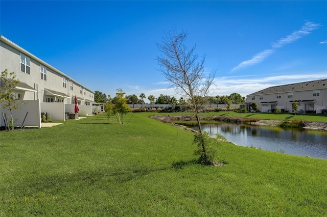 view of yard with a water view