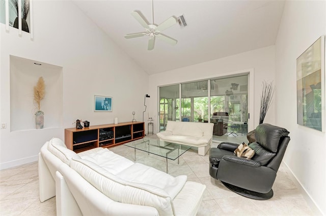 living room featuring light tile patterned floors, high vaulted ceiling, and ceiling fan