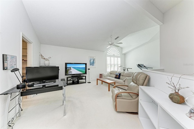 carpeted living room with vaulted ceiling and ceiling fan