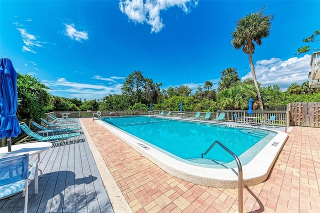 view of pool featuring a patio area