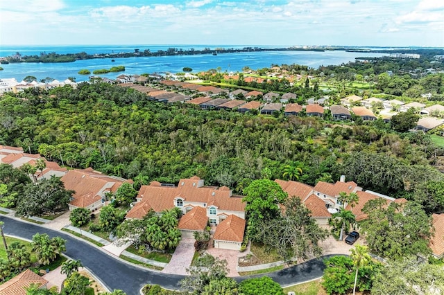 aerial view with a residential view and a water view