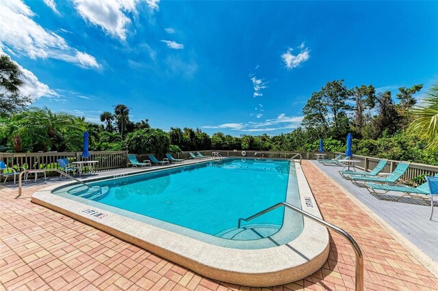 community pool featuring a patio