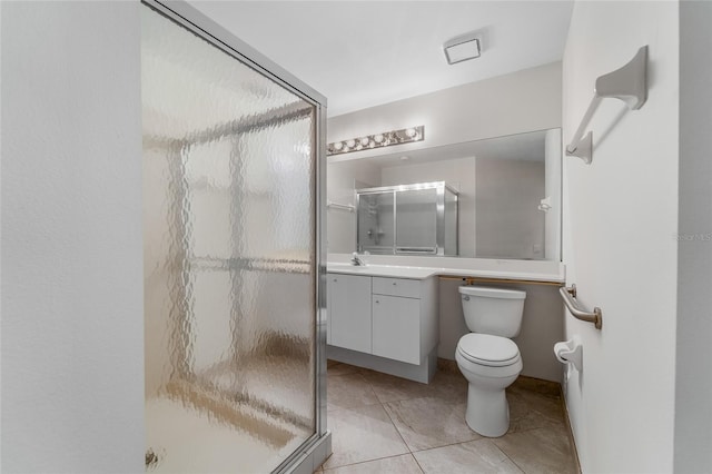 full bath with toilet, a stall shower, tile patterned flooring, and vanity
