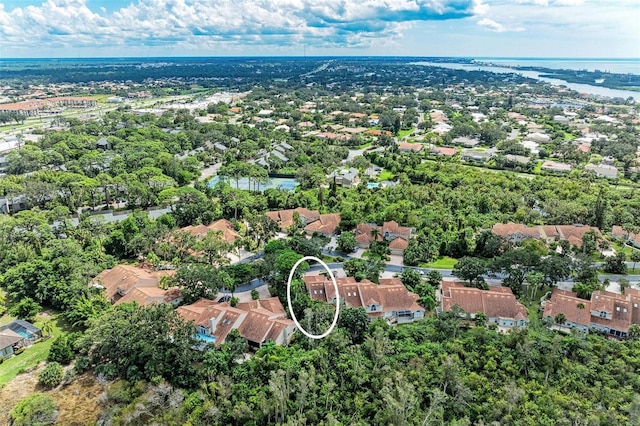 aerial view featuring a residential view and a water view