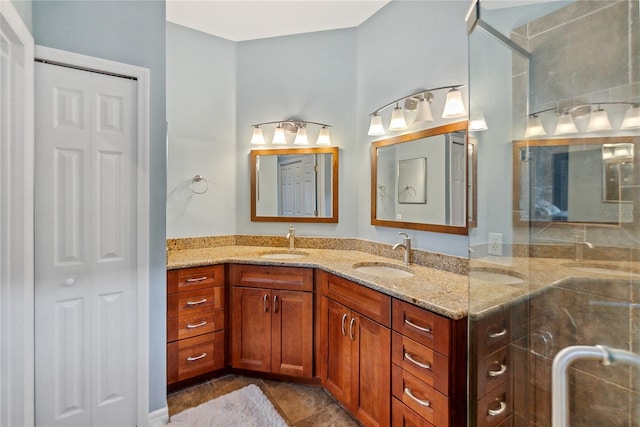 bathroom with vanity and tile patterned floors