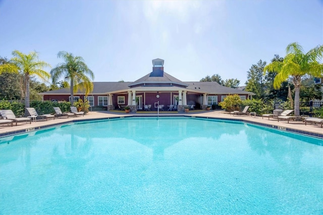 view of swimming pool featuring a patio area