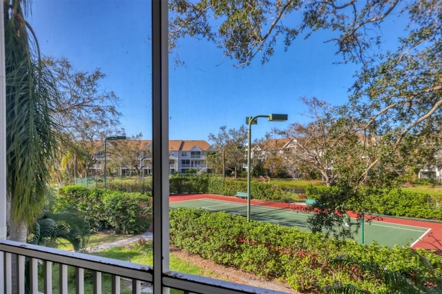 view of sport court with tennis court