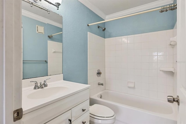 full bathroom featuring vanity, toilet, tiled shower / bath combo, and ornamental molding