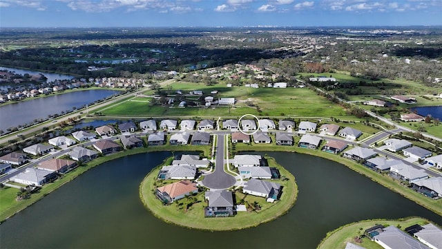 bird's eye view with a water view