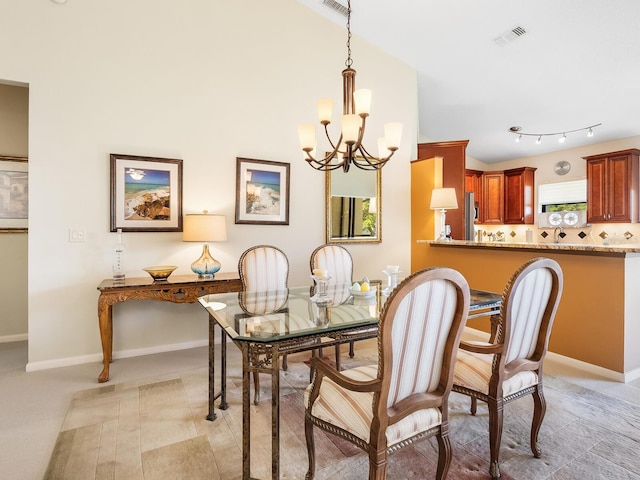 dining area featuring a chandelier