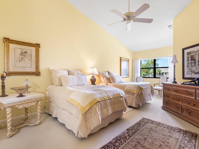 carpeted bedroom with a textured ceiling, ceiling fan, and high vaulted ceiling