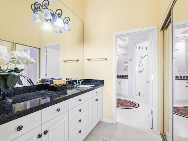 bathroom with tile patterned flooring and vanity