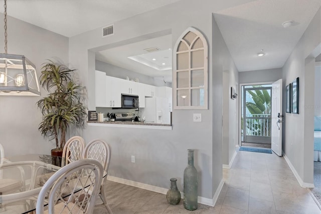 interior space featuring light tile patterned flooring