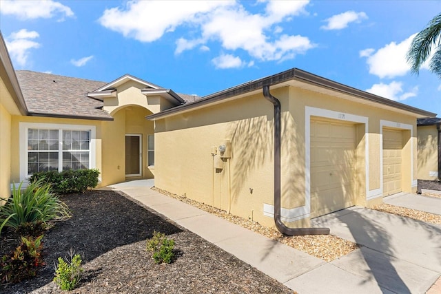 view of home's exterior with a garage