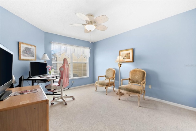 home office featuring ceiling fan and carpet