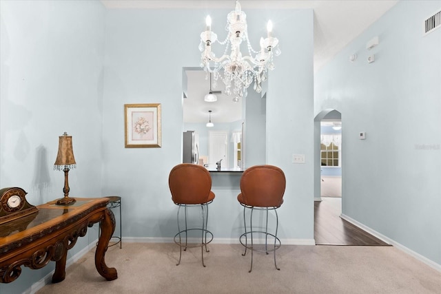 dining area featuring carpet flooring