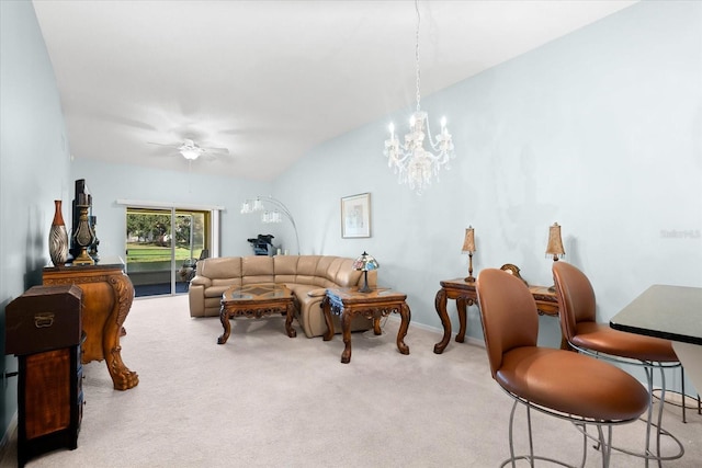 carpeted living room with lofted ceiling and ceiling fan with notable chandelier