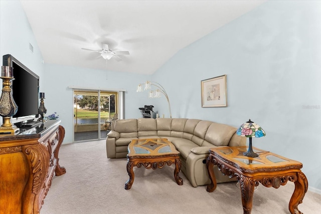 living room with lofted ceiling, light carpet, and ceiling fan