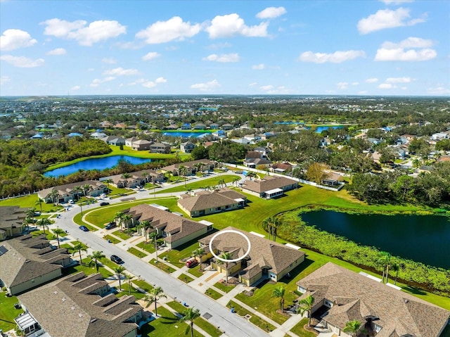 bird's eye view with a water view