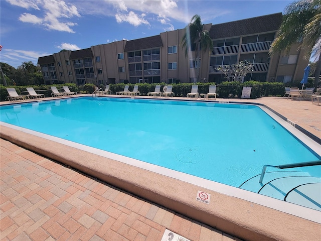 view of pool featuring a patio area