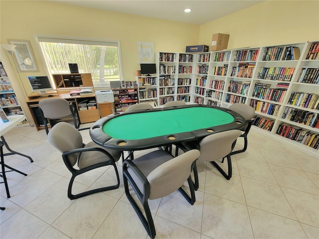 rec room featuring light tile patterned flooring