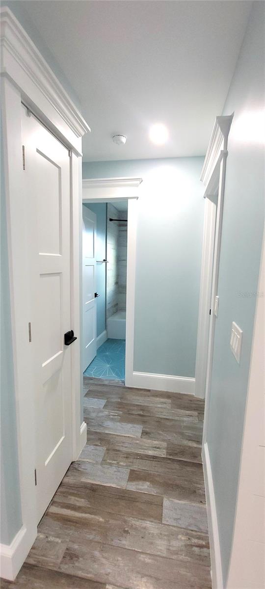 hallway featuring light wood-type flooring