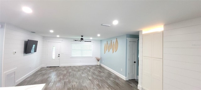 foyer with ceiling fan and hardwood / wood-style floors