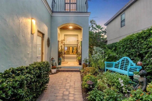 exterior entry at dusk with french doors