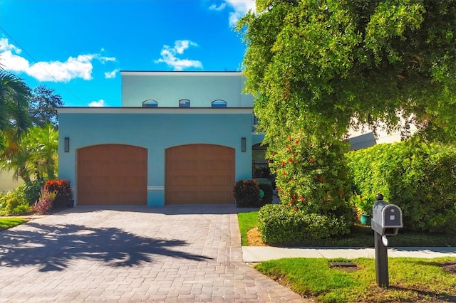 view of front of property featuring a garage