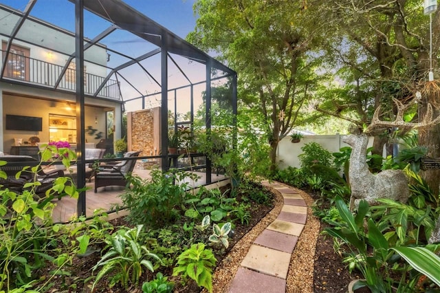 view of yard with a patio and a lanai