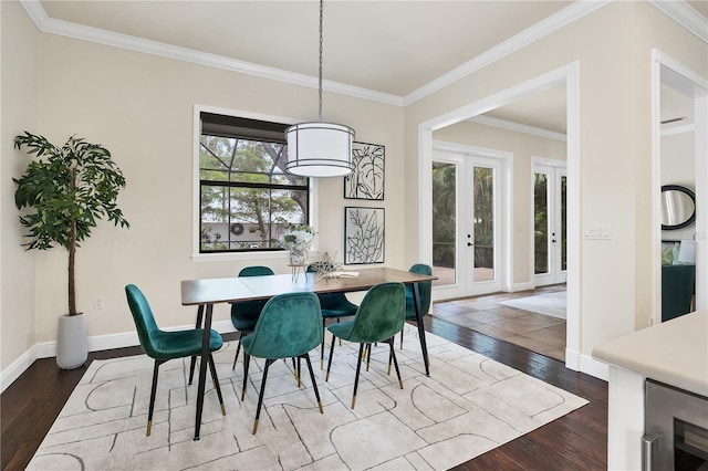 1884 Grove St, Sarasota, FL 34239 - dining room with hardwood / wood-style flooring, baseboards, french doors, ornamental molding, and beverage cooler