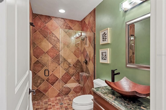 1884 Grove St, Sarasota, FL 34239 - full bath featuring a stall shower, toilet, vanity, and recessed lighting